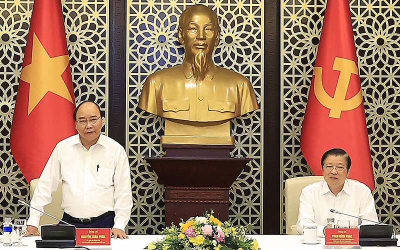 Chủ tịch nước Nguyễn Xuân Phúc phát biểu ý kiến tại buổi làm việc. (Ảnh TTXVN)