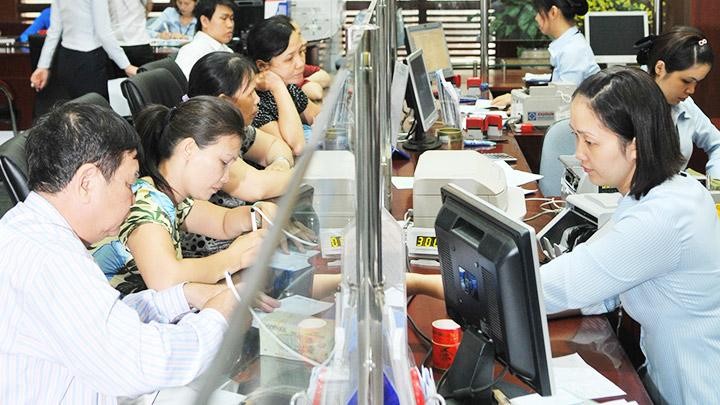 Nhu cầu tín dụng của khách hàng cá nhân và doanh nghiệp rất lớn trong bối cảnh nền kinh tế Việt Nam mở cửa trở lại. Ảnh: BẮC SƠN